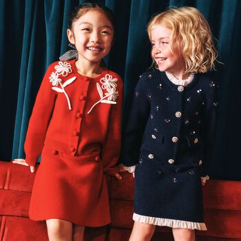 تنورة محبوكة للبنات باللون الأزرق الداكن مزينة بالترتر