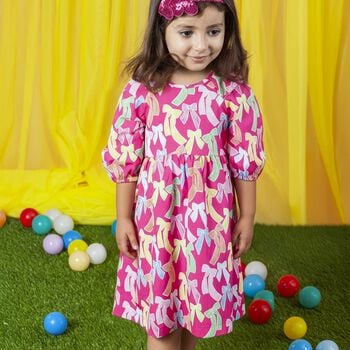 فستان للبنات مزين بفيونكة  باللون الوردي