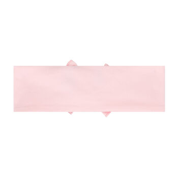 ربطة رأس بالشعار باللون الوردي
