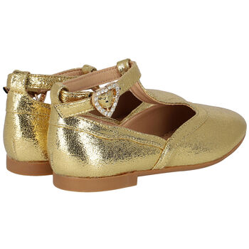 حذاء باللون الذهبي للبنات