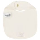 مريلة بنات بالشعار باللون العاجي, 1, hi-res