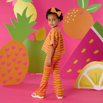 مشبك شعر مخطط باللون الوردي والبرتقالي والأصفر للبنات