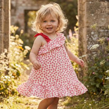 فستان  للبنات الصغيرات مزين بالنجوم باللون الابيض والاحمر 