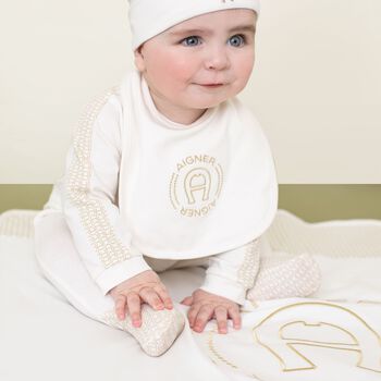 مريلة أطفال بشعار باللون عاجية